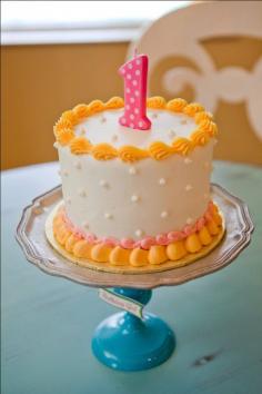 I love the little cake at this peach-themed birthday party.  It's uncomplicated and just adorable.  AE