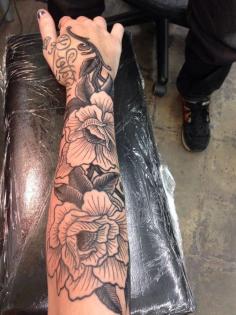 Flower Sleeve Tattoo....I dont like the hand bit though