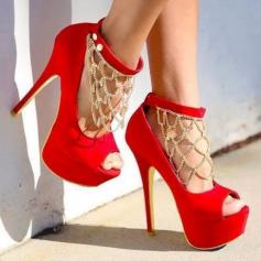 Red high heels with gold chains