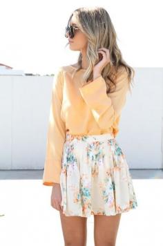 Tucked in shirt, floral skirt, so pretty!