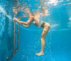 Get Toned in the Pool: Workouts: Self.com:Shed pounds in the pool without swimming laps (or sweating buckets). Our cool workout is a hot-day hit that gets results fast.