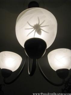 Fake spider inside fixture!  Halloween Decor. Ha, omg I would die