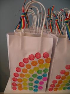 party favor bags--use poster dotters to make a rainbow.  Tie some rainbow ribbon to the top!