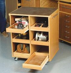 rolling cart - fits under a workbench - storage for tools. Neat!