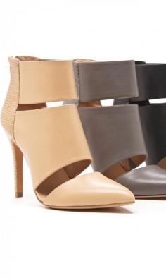 Genuine leather heels with pointed toe, cut out detail and hooded ankle cuff. Includes an easy back zipper.