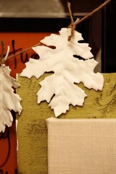 these stylish leaves are fabric ones from the dollar store... dipped into plaster of paris. FABulous idea for garlands, wreaths, table decor, and more...