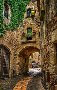 Medieval portal in Pals, Girona, Spain •