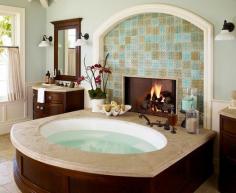 Bathtub with fireplace might be the best idea ever!