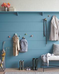 Mount knobs at kid-friendly heights to eliminate entryway clutter.