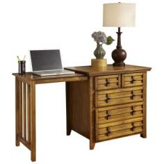 Arts and Crafts Expand-A-Desk - Cottage Oak by Home Styles 5180-93. Finding a piece of quality furniture for a compact space to study or manage a household can prove to be difficult. Home Styles has solved that problem with the not only functional, but stylish Arts & Crafts Expand-a-Desk. Constructed of ash solids and oak veneers in a Distressed Cottage Oak finish, this desk can be used as a larger night stand, side table, or standalone piece when closed. With a 24.5 inch pull-out side that expand the work surface to 54.5 inches which can be used from either side, you decide when assembling, two storage drawers, and a file drawer, this desk's distinctive design lets you work virtually anywhere in your home. Black Matte Hardware. Size: 30w 22d 30h Specification This item includes: HS-5180-93 Arts and Crafts Expand-a-Desk - Cottage Oak - Home Styles Please refer to the Specifications to determine what items are included since sometimes the image shows more or less items. If you are not sure, please contact us and our customer service will be glad to help.
