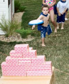 Super Hero Game. Knock down the wall with Captain America's shield (AKA frisbee with logo). Kids loved it!