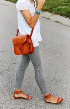 White boho blouse, gray jeans, cognac accessories