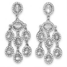 Stunning silver tone post back chandelier fashion earrings with oval clear crystals. The 7.5mm x 9.5mm oval crystals are surrounded with 1.5mm round crystals. The earrings hang approximately 2.75. Fashion jewelry contains base metal.