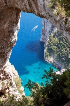 Isle of Capri, Italy.  Still the single most beautiful place I have been to.  Should be one of the wonders of the world!