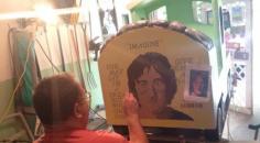 Putting the FINAL touches on Mr. Lennon as he rides my PEACE TRAIN !