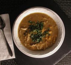 Peanut Stew with Chicken from Ghana: sweet potatoes, onions, garlic, crushed tomatoes, peanut butter, chicken, and spices.