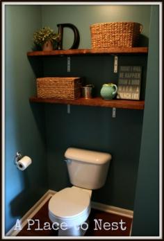 cute shelves above camode. A Place to Nest: Chunky bathroom shelves.