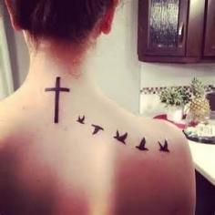 I would just get the birds. If I got a cross it would be more detailed and in a different spot.