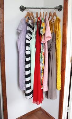 DIY Mini Corner Closet [Tutorial] : great idea for a guest room with little to no closet space!