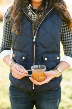 puffer vest, sweater, statement necklace and watch! Maybe not the white button up underneath but this is cute!!