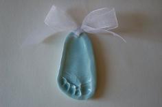 Footprint Christmas Craft Ideas ornament:equal parts salt and flour, add water to make into a dough then bake at 200 degrees for 3hrs. then use acrylic paint topped with acrylic gloss spray paint.