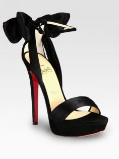Christian Louboutin  (These are my favorite designer shoes in the whole world!!)
