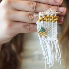 Learn to weave by making your own woven necklace.
