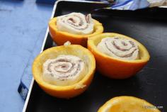 Cook cinnabuns (the canned kind) in a hollowed-out orange over a campfire. | 41 Camping Hacks That Are Borderline Genius