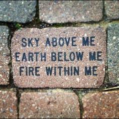 Sky above me, earth below me, fire within me. ...& my conch, are in the Ocean.