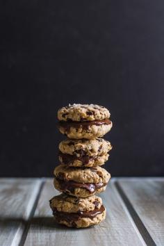 Peanut Butter Cup Oatmeal Cookie Sandwiches | edibleperpsective... #vegan #glutenfree
