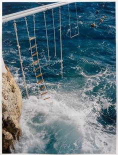 swings above the ocean in south france