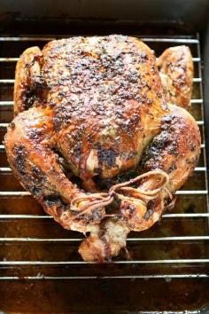 EASY and delicious Roasted Chicken - whole chicken, softened butter, parsley, vegetable oil, rosemary, salt, thyme, pepper