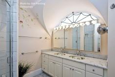 
                        
                            The artistic detail of this bathroom is commendable. The curved ceiling, hand-painted mural sinks and the arched spider web window drizzle a bit of creative flare within the space. #artsy
                        
                    
