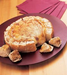 Blooming Brie Bowl Recipe Appetizers with garlic powder, ground mustard, sugar, butter, round sourdough bread, brie cheese