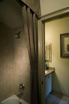 
                        
                            Inviting contemporary bathroom with tile floors, a granite backsplash and shower shades. Click on the pin to see 7 amazing and cheap shower accessories we know you will love! #showers
                        
                    