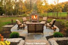 
                        
                            Small patio area with a tile walkway, a small brick fireplace and plenty of outdoor furniture. Did you know an outdoor fireplace can be as cheap as $1,400?
                        
                    