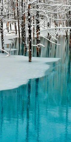 (via 500px / Blue Pond & Spring Snow,Hokkaido by Kent Shiraishi