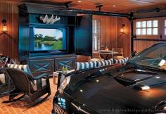 
                        
                            This man cave garage may be a little too close for comfort, but we love that brick floor and black, vintage armoire for the TV. #garages #mancave
                        
                    