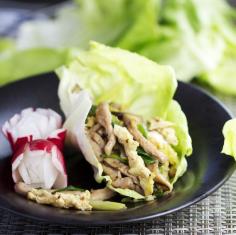 Moo Shu Pork Lettuce Wraps - Lettuce leaves wrapped around a tasty stir-fry of cabbage, mushrooms, egg, and pork with ginger, garlic, scallions and soy sauce.