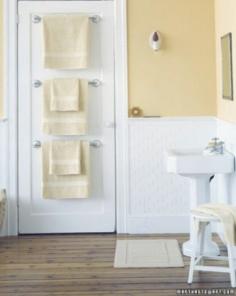 30 Brilliant Bathroom Organization and Storage DIY Solutions - Bathroom Organizers - You should always make use of empty space and this includes the space on the back of your bathroom door. You can hang towel holders down the length, giving you room to keep several towels and washcloths.