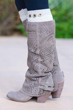 Suede leather perforated boots! Genuine suede leather is intricately punched with lace-like geometric designs along a slouchy shaft and two silver-buckled accen