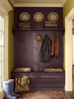 purple wall, purple niche, built in coat rack, built in hat rack, built in cubbies, mudroom in hallway, back hallway, open coat storage