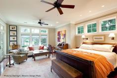 Transitional bedroom with a dark wood bed frame, an extra seating area and clerestory windows. Plenty of natural sun. Could use some color. #bedrooms