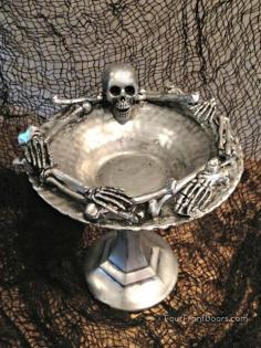 Skeleton Dish. Take apart a Dollar Store skeleton & glue (E6000) to glass plate. Spray w/silver paint. Dry. Paint over w/black acrylic paint in small area at a time. Wipe off w/rag.
