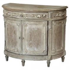 Perfect for stowing accessories in your master suite or creating a home bar in the parlor, this oak cabinet showcases a weathered finish and scroll details. ...