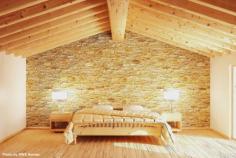They call this a modern bedroom but the vaulted ceiling, pine timbers, hardwood floors and stone accent wall scream rustic. It's certainly bright and spacious.