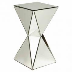 Showcasing a geometric-inspired silhouette and mirrored panels, this eye-catching end table is perfect for setting a bouquet of fresh blooms or your favorite...
