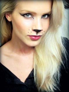 
                        
                            You can't go wrong with a cat costume, and I particularly love this one because of how trendy the cat eye has become this year. Simply line your eyes and black out the tip of your nose for a feline look.
                        
                    