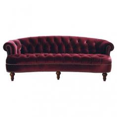 Bring Old Hollywood glamour to your living room or den with this burgundy velvet sofa, featuring button-tufted upholstery and an elegant nailhead trim. ...