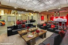 This garage and man cave has it all. They added a separate area for a full bar, two leather couches, comfortable rug and a wavy ceiling. #mancave #mancavegarage